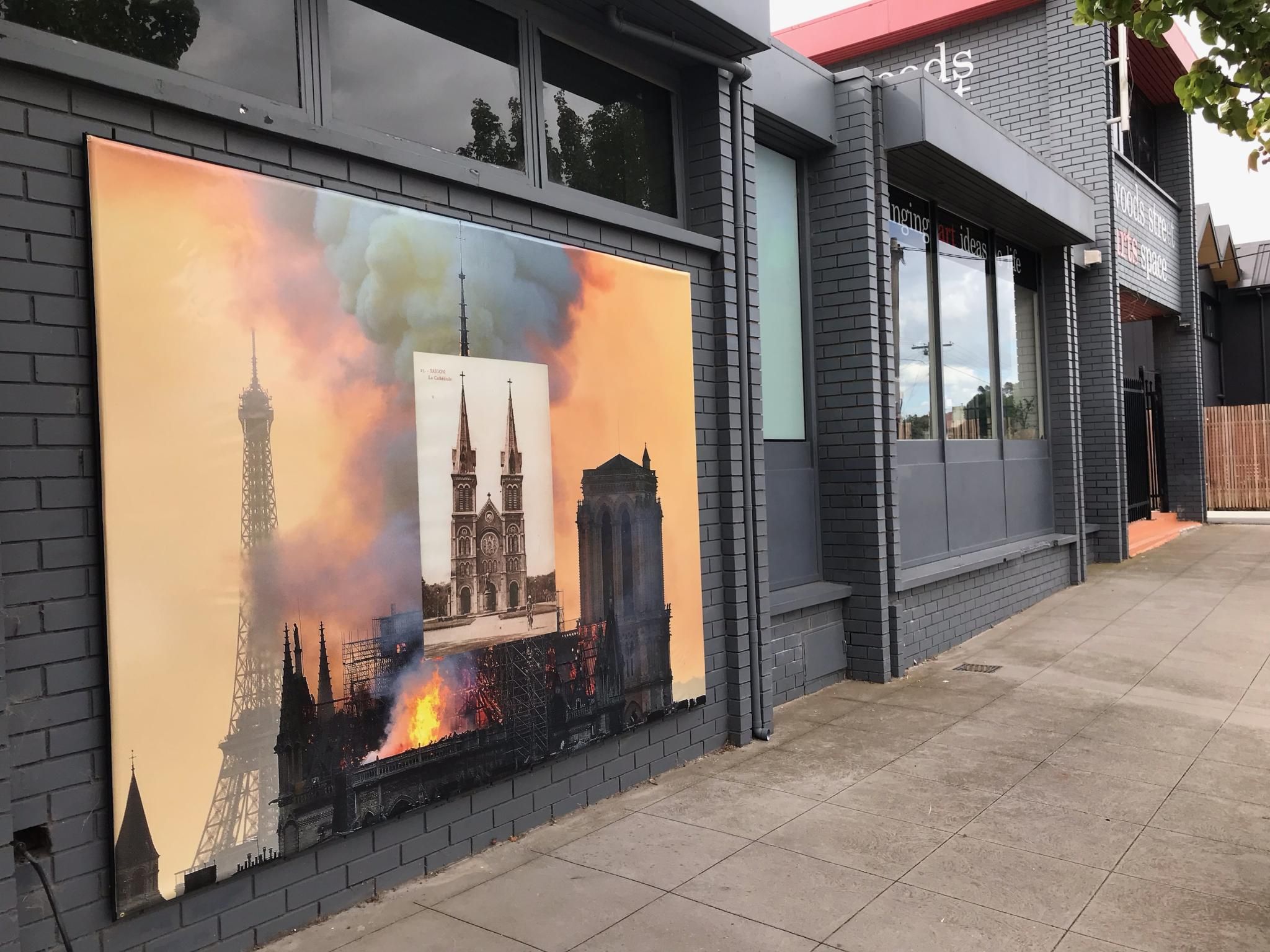 Billboard depicting images of multiple buildings as part of Phuong Ngo exhibition